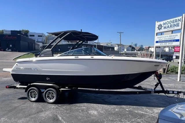 Slide: The Image of 2025 Chaparral 247 SSX boat on trailer at Modern Marine dealership. - 5