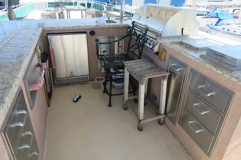 Slide: The Image of Control panel of a 2001 Sumerset houseboat with gauges and navigation equipment. - 12