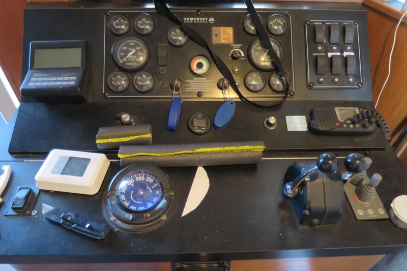 Slide: The Image of Outdoor kitchen on 2001 Sumerset houseboat with grill, fridge, and storage drawers. - 14