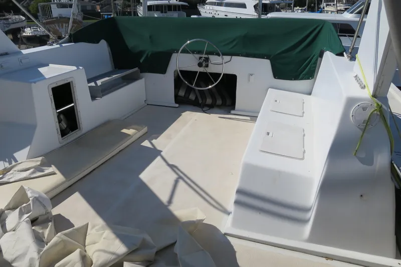 Slide: The Image of 2001 Sumerset houseboat on dry dock, showcasing exterior design and structure. - 3