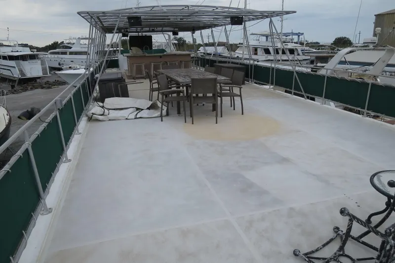 Slide: The Image of Outdoor kitchen on 2001 Sumerset houseboat with granite countertops and grill. - 7