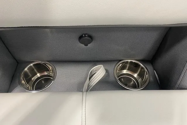 Slide: The Image of Cup holders and storage compartment in 2026 Bentley Pontoons Legacy 223 Swingback. - 10