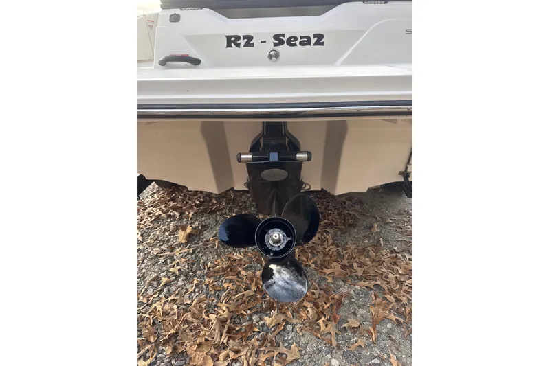 Slide: The Image of 2023 Sea Ray SPX 210 engine compartment with 200 horsepower motor. - 32