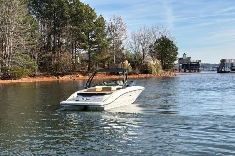Slide: The Image of FBC Service Promise details: engine warranty, financing, certified maintenance, and free water training for Sea Ray SPX 210. - 5