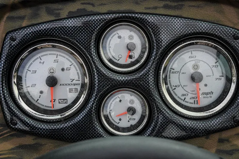 Slide: The Image of Dashboard of 2026 G3 Sportsman 2100 with speedometer and tachometer gauges. - 11