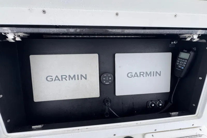 Slide: The Image of 2007 Yellowfin 31 Center Console with Garmin navigation and communication equipment. - 27