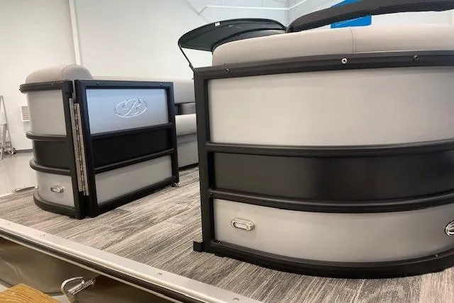 Slide: The Image of 2026 Bentley Pontoons Legacy 243 Navigator, sleek design, modern pontoon boat interior. - 2