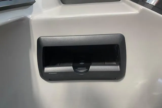 Slide: The Image of 2026 Bentley Pontoons Legacy 243 Navigator dashboard compartment, featuring a sleek black design. - 5