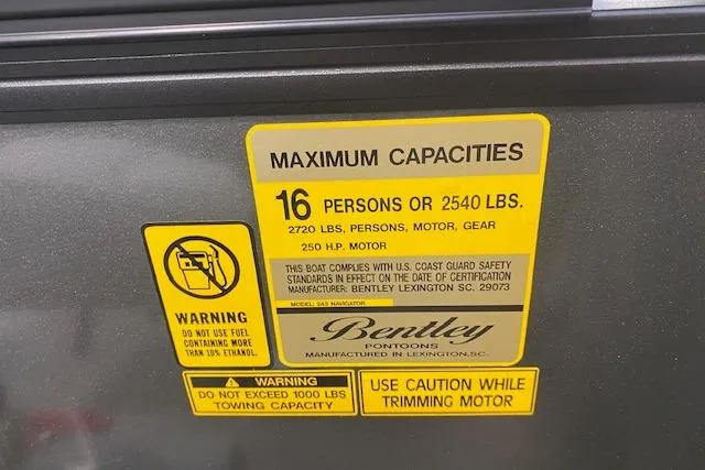 Slide: The Image of 2026 Bentley Pontoons Legacy 243 Navigator capacity label: 16 persons or 2540 lbs, 250 HP motor. - 6