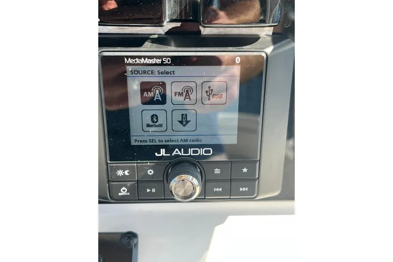 Slide: The Image of JL Audio MediaMaster 50 control panel on 2004 Sea Hunt Ultra 234 boat. - 10