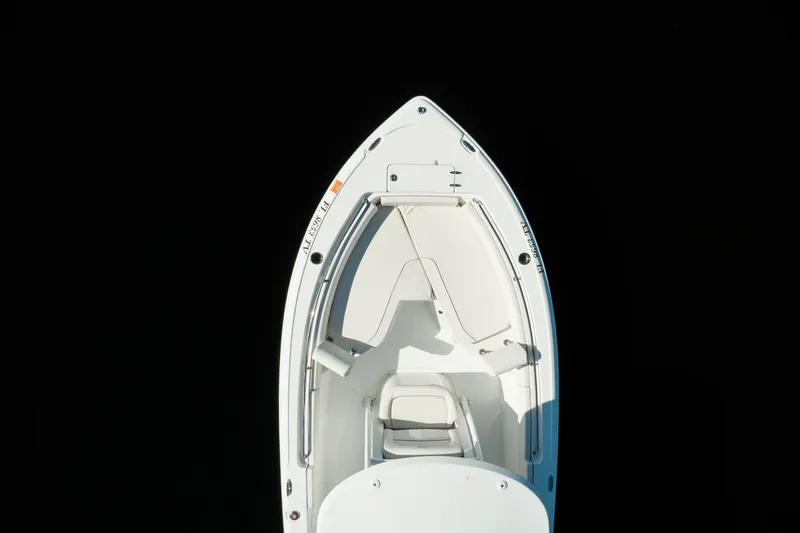 Slide: The Image of Top view of a 2004 Sea Hunt Ultra 234 boat on dark water. - 4