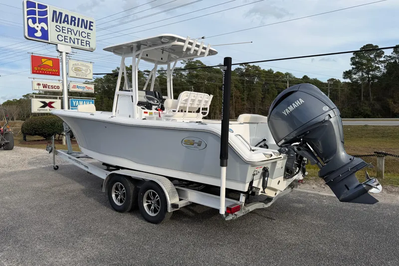Slide: The Image of 2024 Sea Hunt Ultra 229 boat on trailer at Marine Service Center. - 3