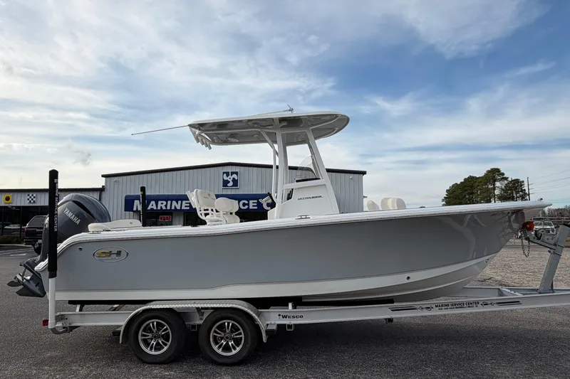 Slide: The Image of 2024 Sea Hunt Ultra 229 boat on trailer at Marine Service Center. - 4