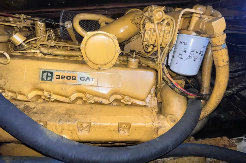 Slide: The Image of CAT 3208 engine in a 1981 Bertram 35 Sportfish boat. - 13