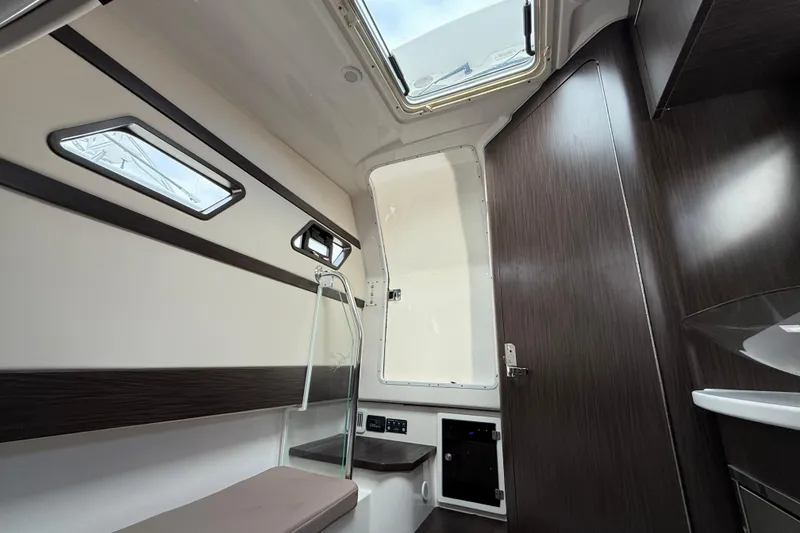 Slide: The Image of Interior of 2020 Edgewater 370CC boat, featuring sleek design and modern amenities. - 16