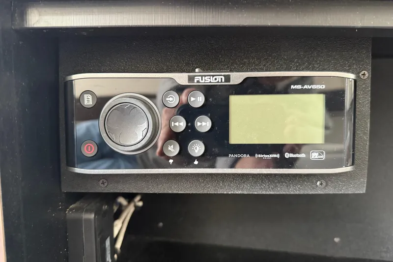 Slide: The Image of Fusion MS-AV650 stereo system in 2020 Edgewater 370CC boat dashboard. - 23