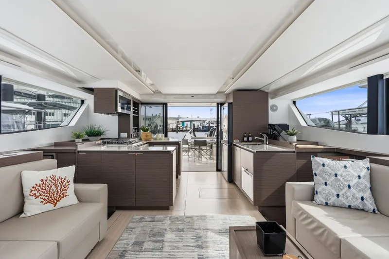 Slide: The Image of Interior of 2025 Leopard 53 Powercat yacht, featuring modern helm and seating area. - 12