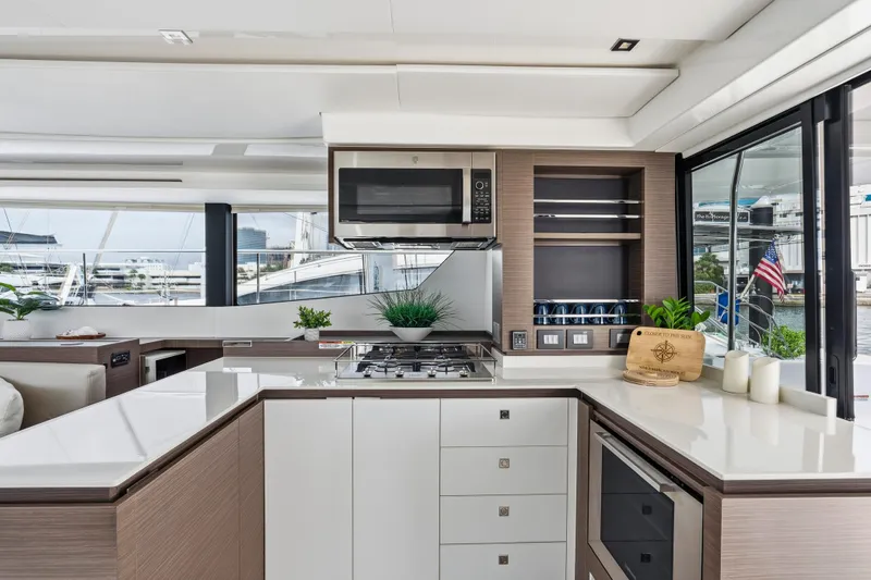 Slide: The Image of Luxurious interior of 2025 Leopard 53 Powercat yacht with modern seating and decor. - 14