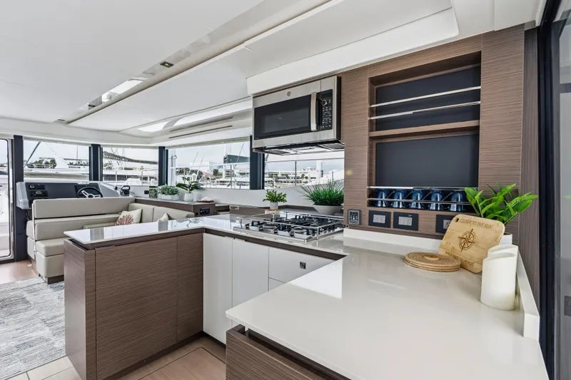 Slide: The Image of Luxurious interior of 2025 Leopard 53 Powercat yacht with modern furnishings and panoramic windows. - 15