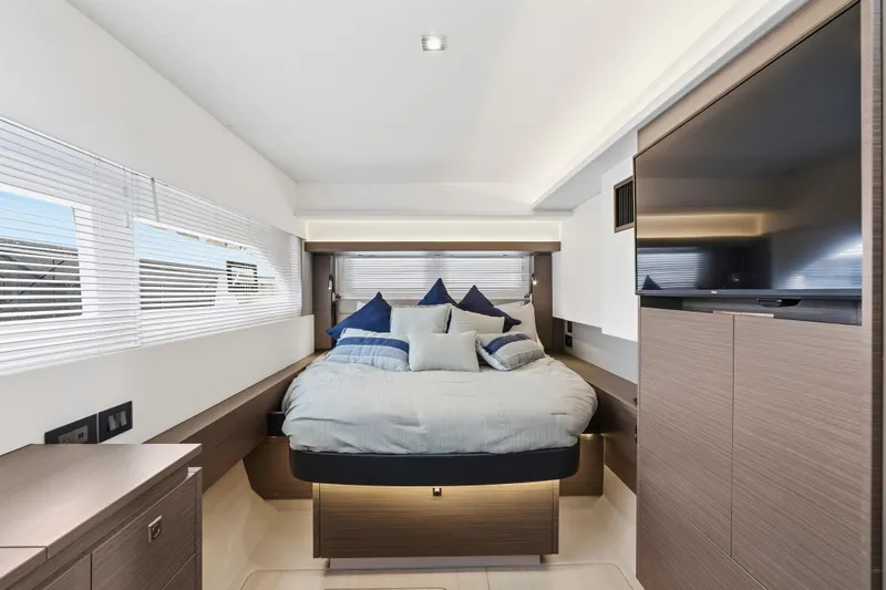 Slide: The Image of Luxurious interior of 2025 Leopard 53 Powercat yacht with modern kitchen and panoramic windows. - 18