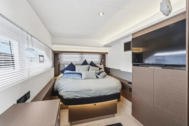 Slide: The Image of Modern kitchen interior on 2025 Leopard 53 Powercat yacht, featuring sleek appliances and ocean view. - 19