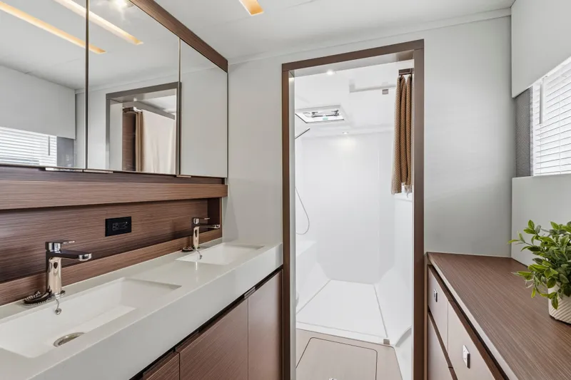 Slide: The Image of Luxurious bedroom interior of 2025 Leopard 53 Powercat yacht with modern furnishings. - 21