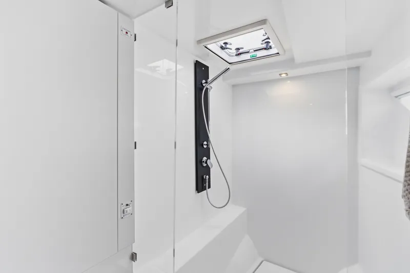 Slide: The Image of Luxurious bathroom interior of 2025 Leopard 53 Powercat yacht with dual sinks and modern design. - 24