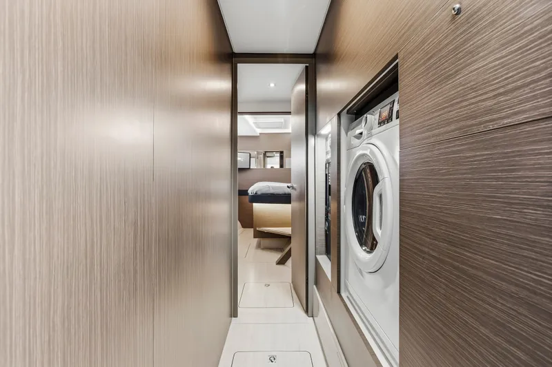 Slide: The Image of Luxurious interior of 2025 Leopard 53 Powercat with modern bathroom and cozy bedroom. - 25