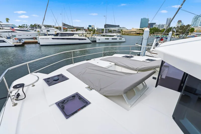 Slide: The Image of Luxurious interior of 2025 Leopard 53 Powercat yacht bedroom with modern decor and TV. - 30