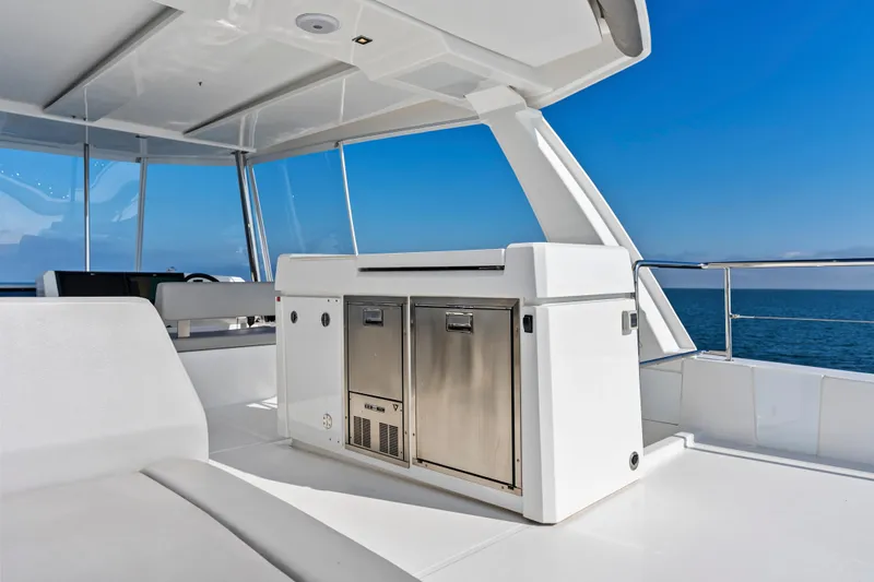 Slide: The Image of 2025 Leopard 53 Powercat yacht interior with sleek design and ocean view. - 52