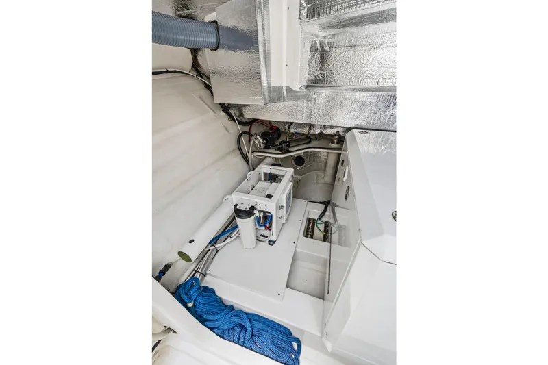 Slide: The Image of Engine room of 2025 Leopard 53 Powercat with equipment and blue rope. - 55