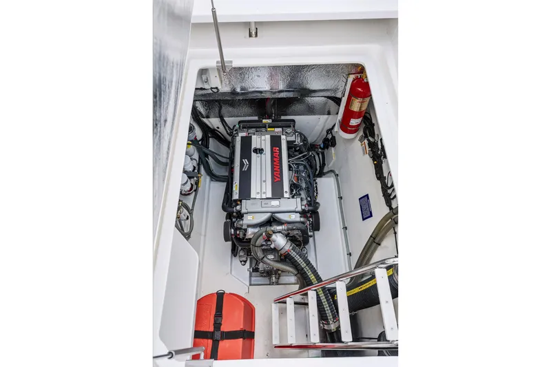 Slide: The Image of Engine compartment of 2025 Leopard 53 Powercat with Yanmar engine and safety equipment. - 56