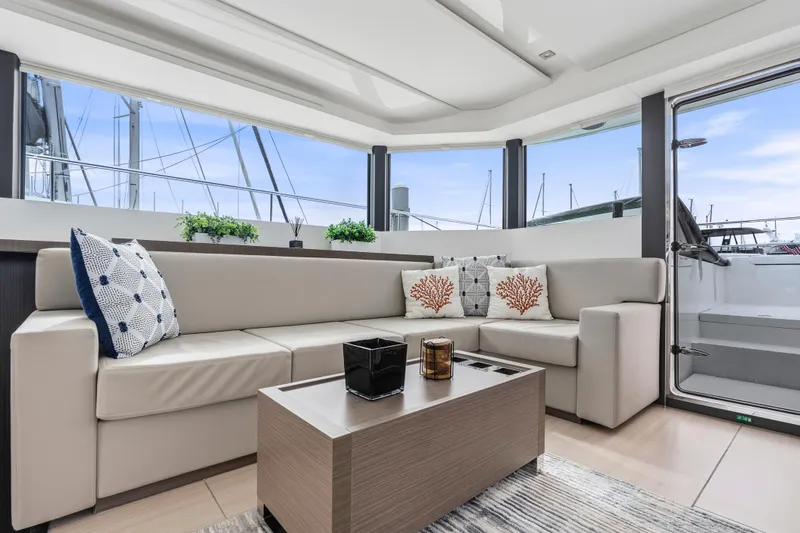 Slide: The Image of 2025 Leopard 53 Powercat cruising on open sea under clear blue sky. - 6