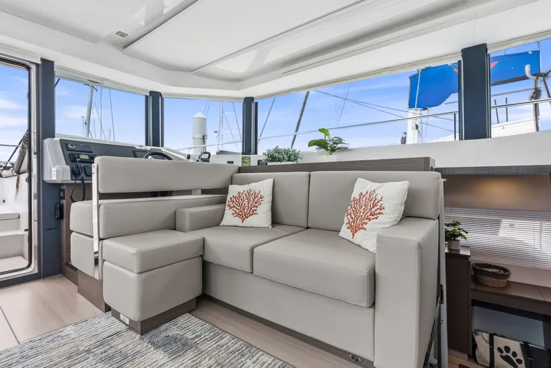 Slide: The Image of Luxurious interior of 2025 Leopard 53 Powercat yacht with modern kitchen and seating area. - 9