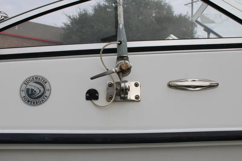 Slide: The Image of 2005 Edgewater 185DC boat detail with logo and hardware. - 23