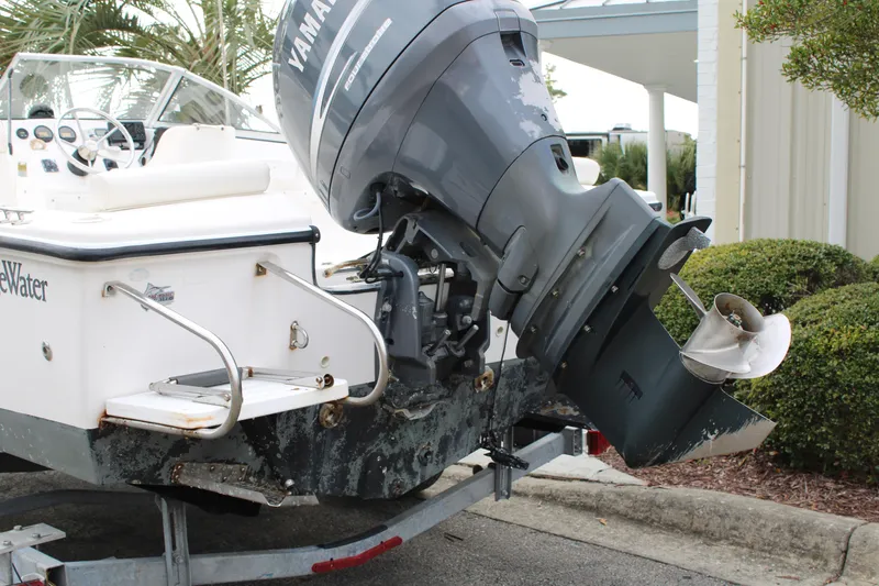 Slide: The Image of 2005 Edgewater 185DC boat with Yamaha outboard motor on trailer. - 7
