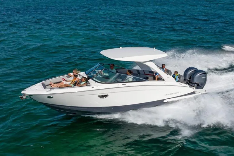 The Image of Manufacturer Provided Image: 2026 Regal LX9 boat cruising on open water with passengers enjoying the ride. - 0