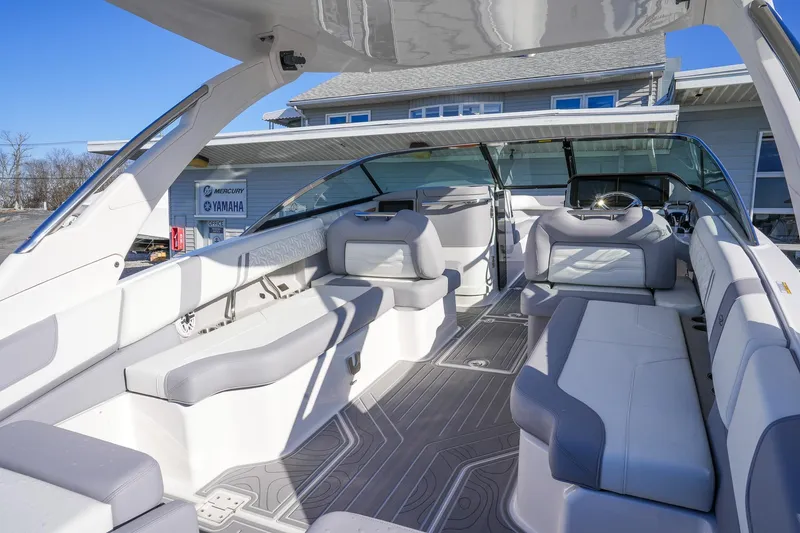 Slide: The Image of Luxurious 2026 Regal LX9 boat interior with sleek seating and modern design. - 12