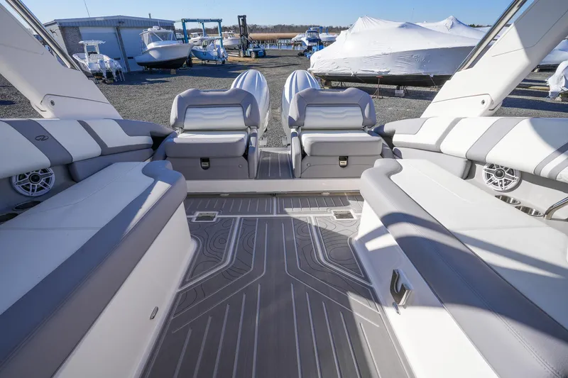 Slide: The Image of Luxurious interior of 2026 Regal LX9 boat with spacious seating and modern design. - 13