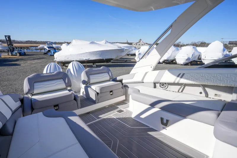 Slide: The Image of Luxurious 2026 Regal LX9 boat interior with sleek seating and modern design. - 15
