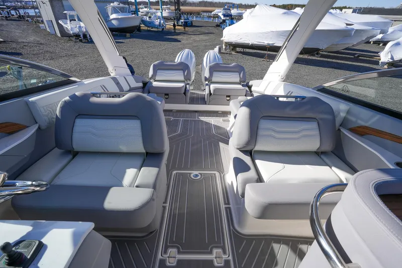 Slide: The Image of Luxurious interior of 2026 Regal LX9 boat with plush seating and modern design. - 24