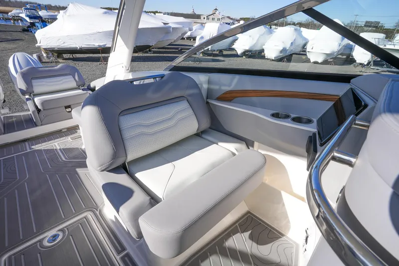 Slide: The Image of 2026 Regal LX9 boat interior with modern seating and sleek design. - 25