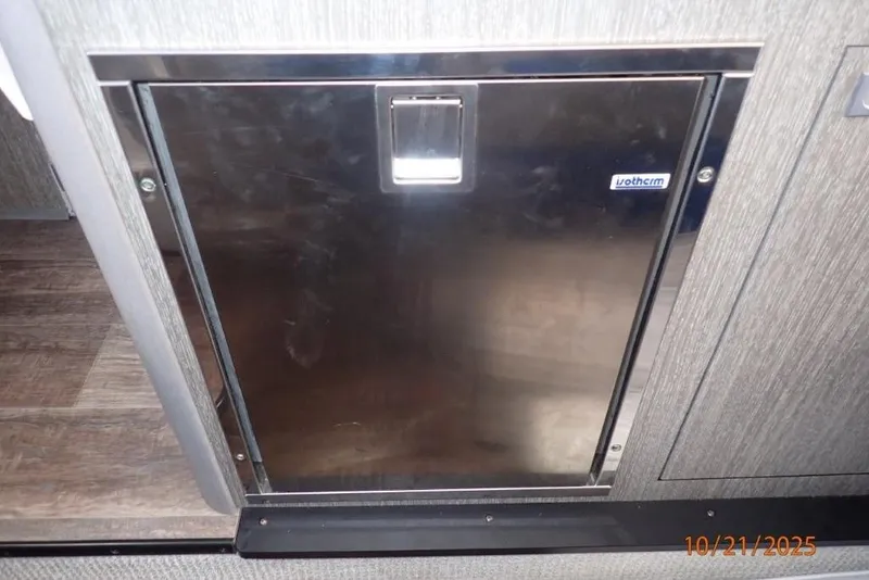 Slide: The Image of Vacuum cleaner in plastic packaging, dated October 21, 2025. - 5