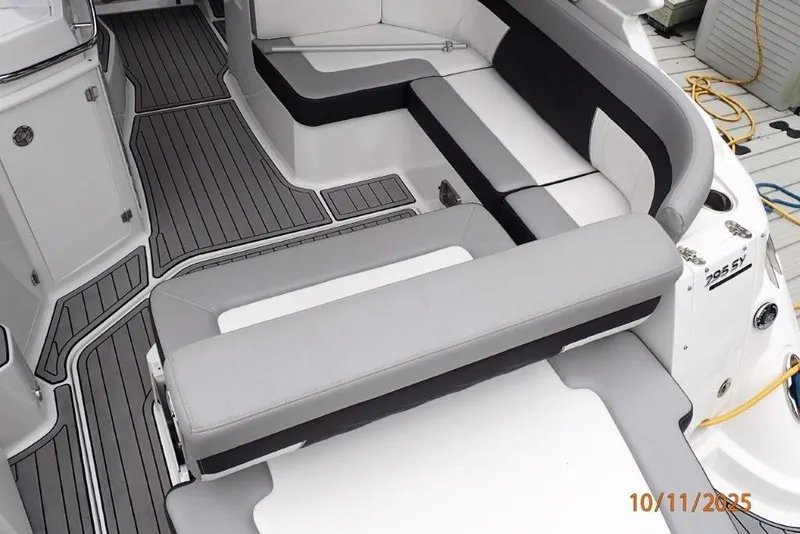 Slide: The Image of Cockpit of 2021 Monterey 295 Sport Yacht with modern controls and steering wheel. - 17