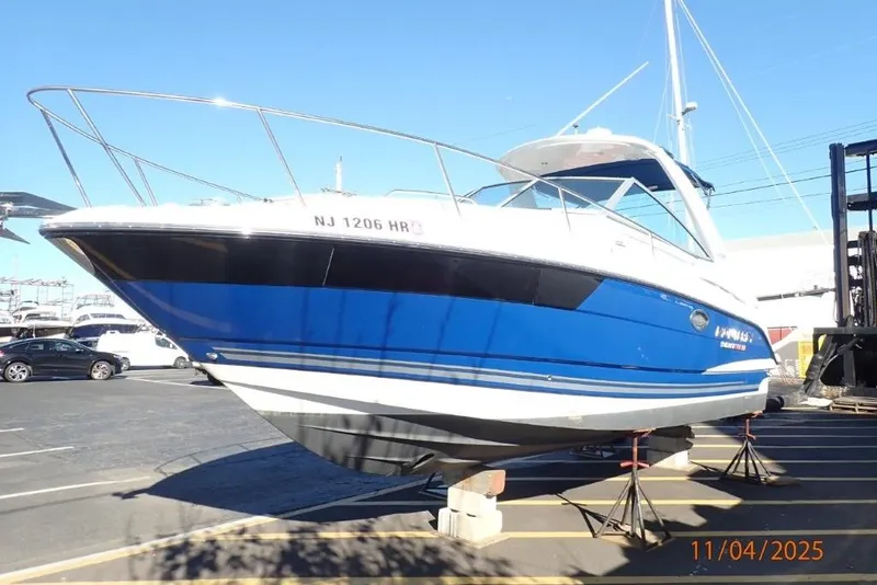 Slide: The Image of Kenyon electric cooktop on 2021 Monterey 295 Sport Yacht, with chrome handles. - 3