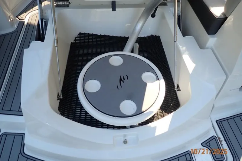 Slide: The Image of 2021 Monterey 295 Sport Yacht shower controls with open panel, dockside view. - 9