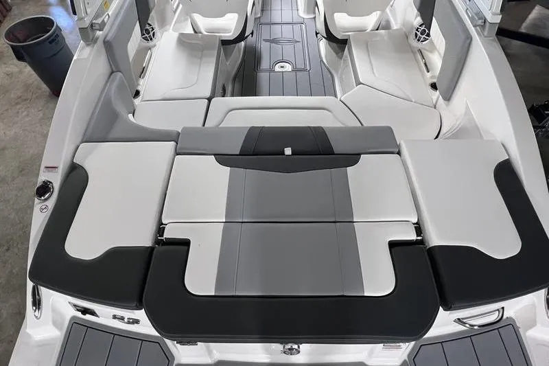 Slide: The Image of 2025 Chaparral 23 SSi boat interior with sleek, modern seating and stylish design. - 21