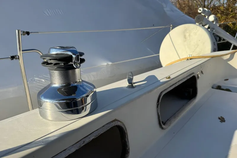 Slide: The Image of Close-up of a 1987 Irwin 38 Mk II sailboat deck with winch and rigging. - 10