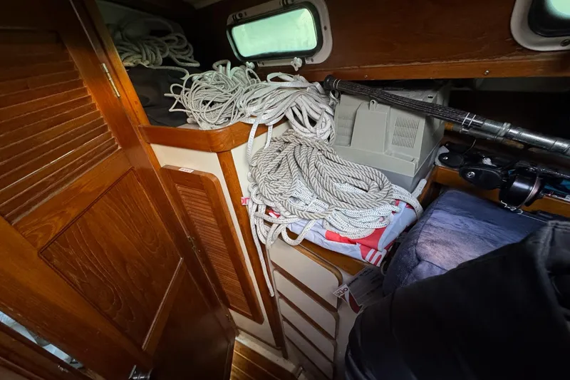 Slide: The Image of Interior of 1987 Irwin 38 Mk II sailboat with ropes and equipment. - 47