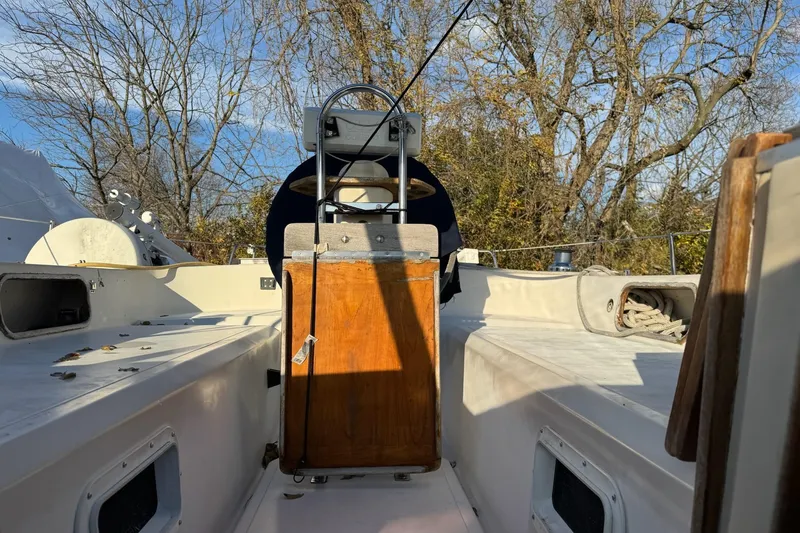 Slide: The Image of Cockpit of 1987 Irwin 38 Mk II sailboat with wooden hatch and clear sky. - 5